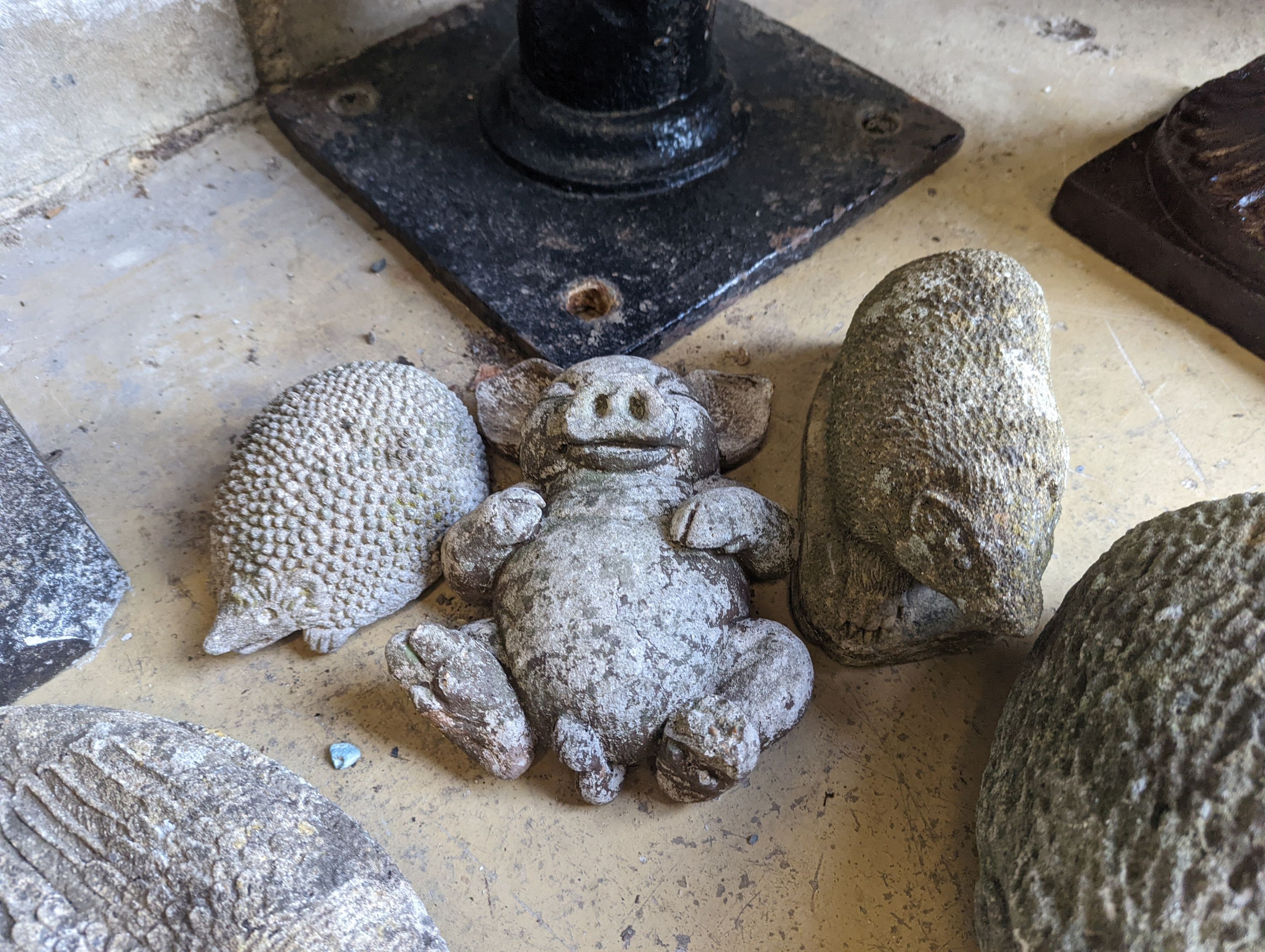 Five reconstituted stone animal garden ornaments, largest width 28cm